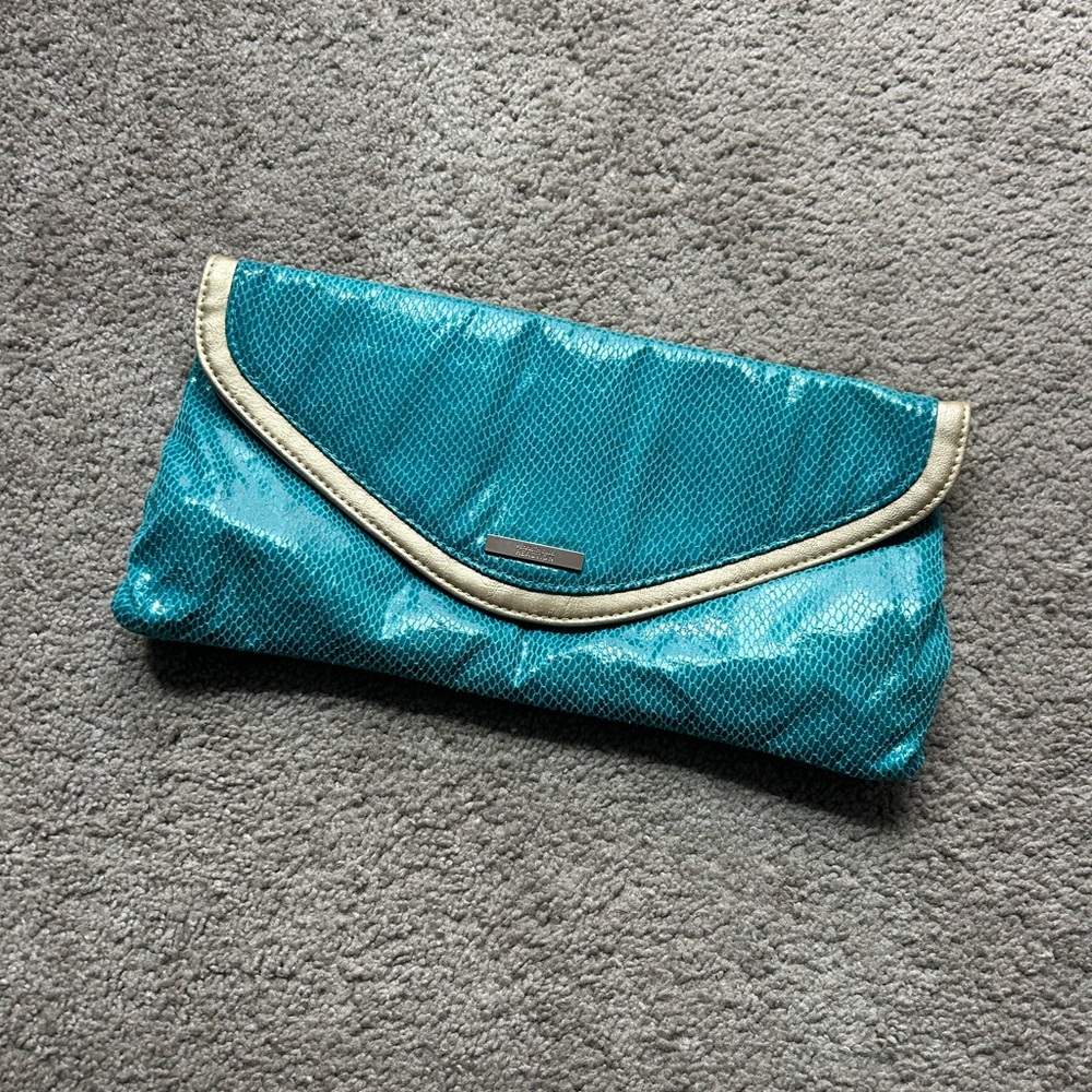 Kenneth Cole‎ Reaction Clutch